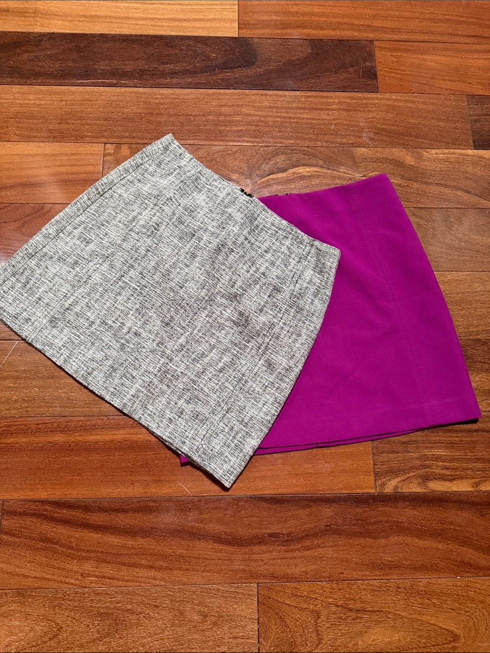 Two Loft mini skirts.